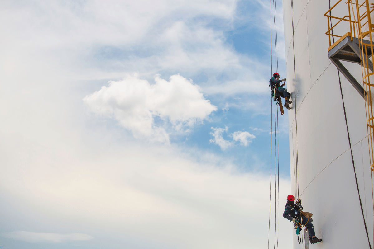 Two Severn Access rope access technicians carrying out wind turbine maintenance on a wind farm