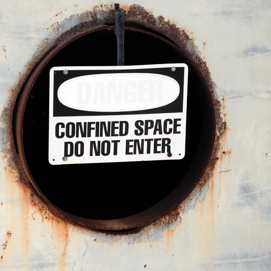 A sign reading 'confined space' symbolisin the confined space rescue team services Severn Access offers in Birmingham