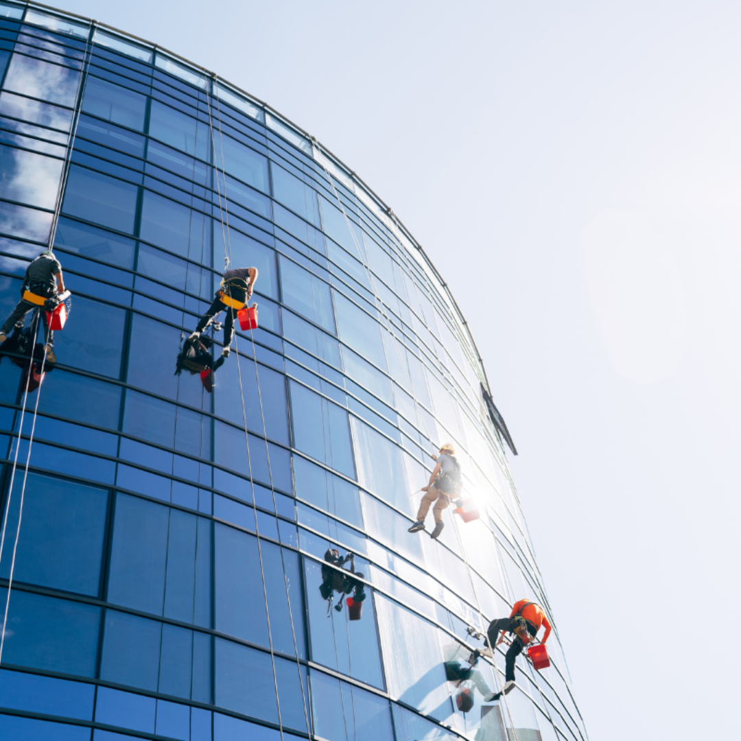 Four Severn Access rope access contractors carrying out Birmingham facade cleaning services