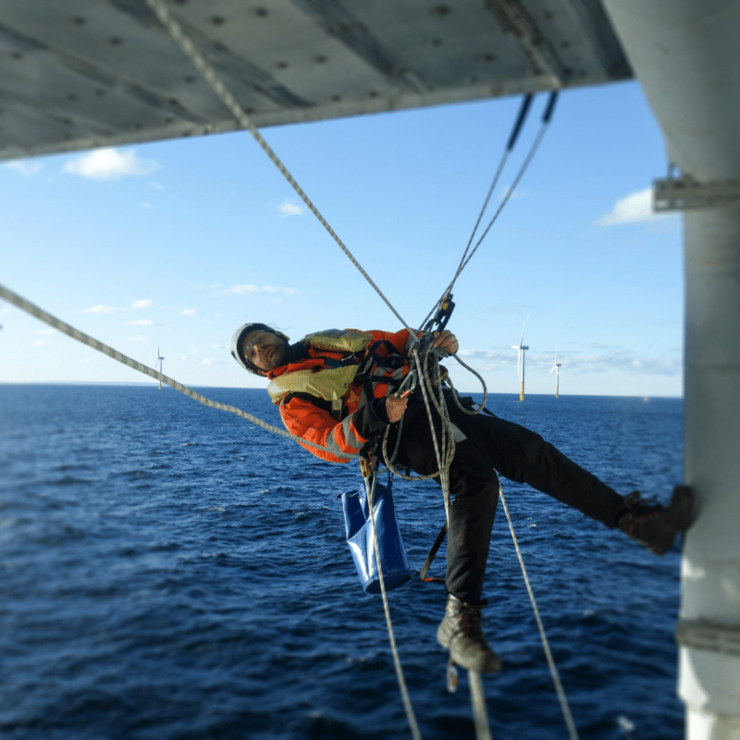 A Severn Access technician delivering rope access services on a wind farm